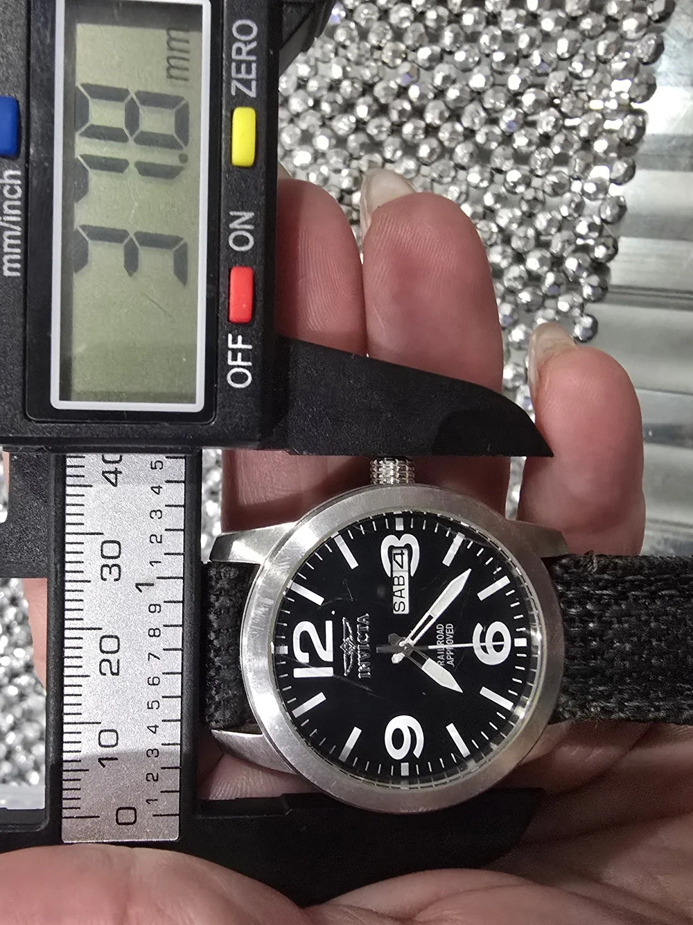 Invicta Men's Black Dial Watch with Silver Case and Black Canvas Strap